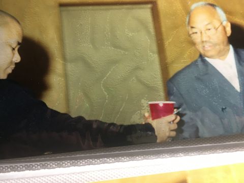 Raising a cup